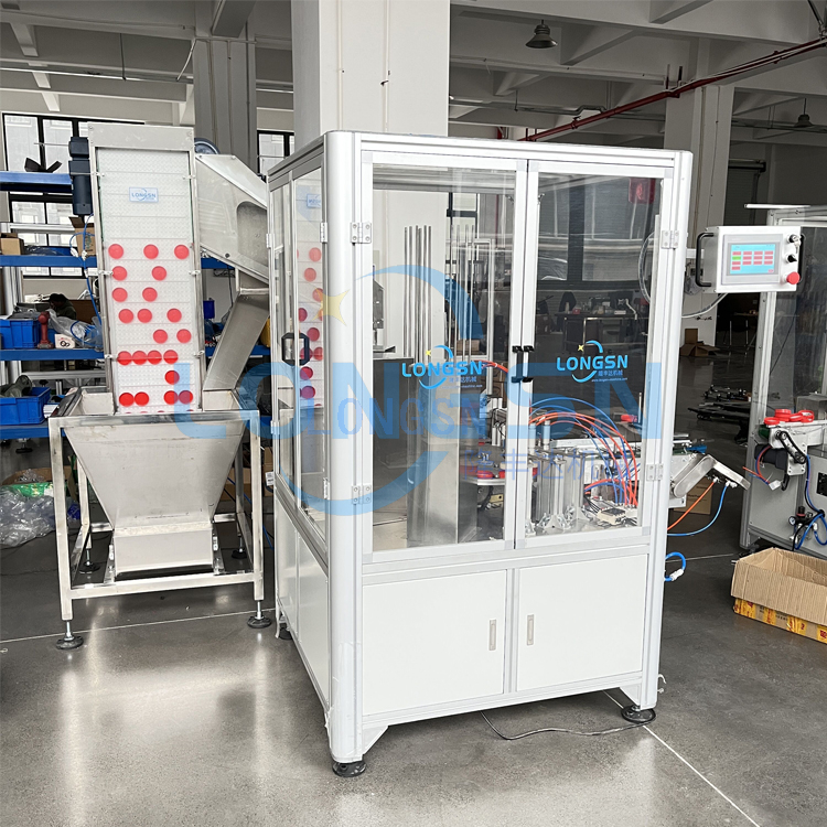 Einf&uuml;gen von Kappendichtungsk&ouml;rpermaschine