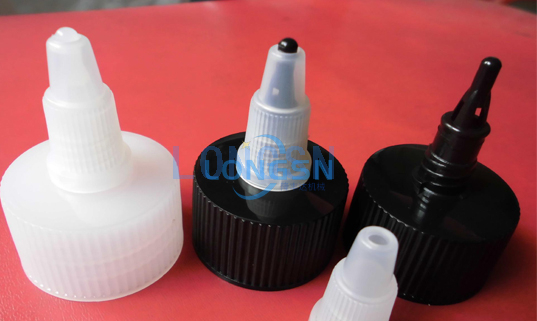 Auslaufkappenmontage-Maschine