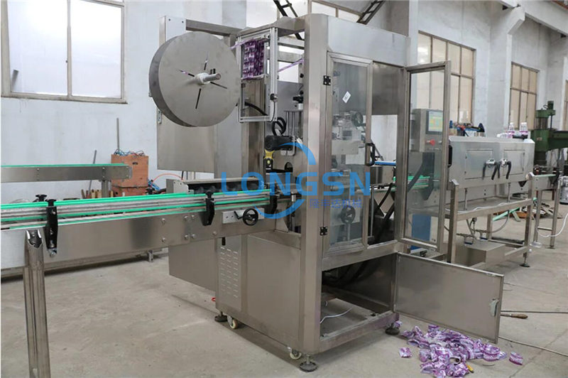 H&uuml;lle -Etikettenmaschine